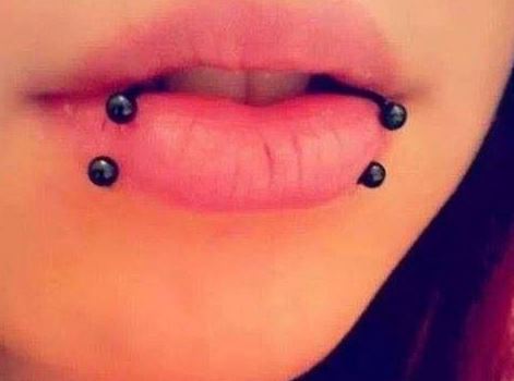 spider lip piercing