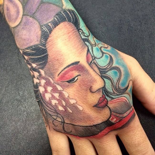 hand tattoo of geisha