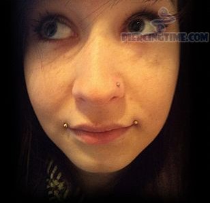 Girl With Nose And Dahlia Bites Piercing