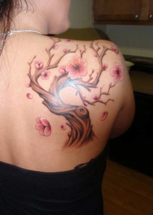 cherry blossom tree tattoo on shoulder blade