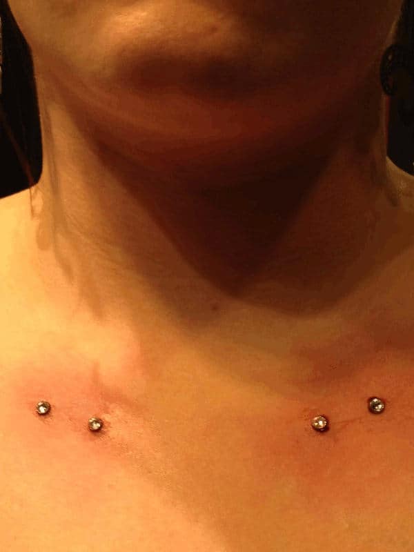 Collarbone Piercing With Dermal Anchors