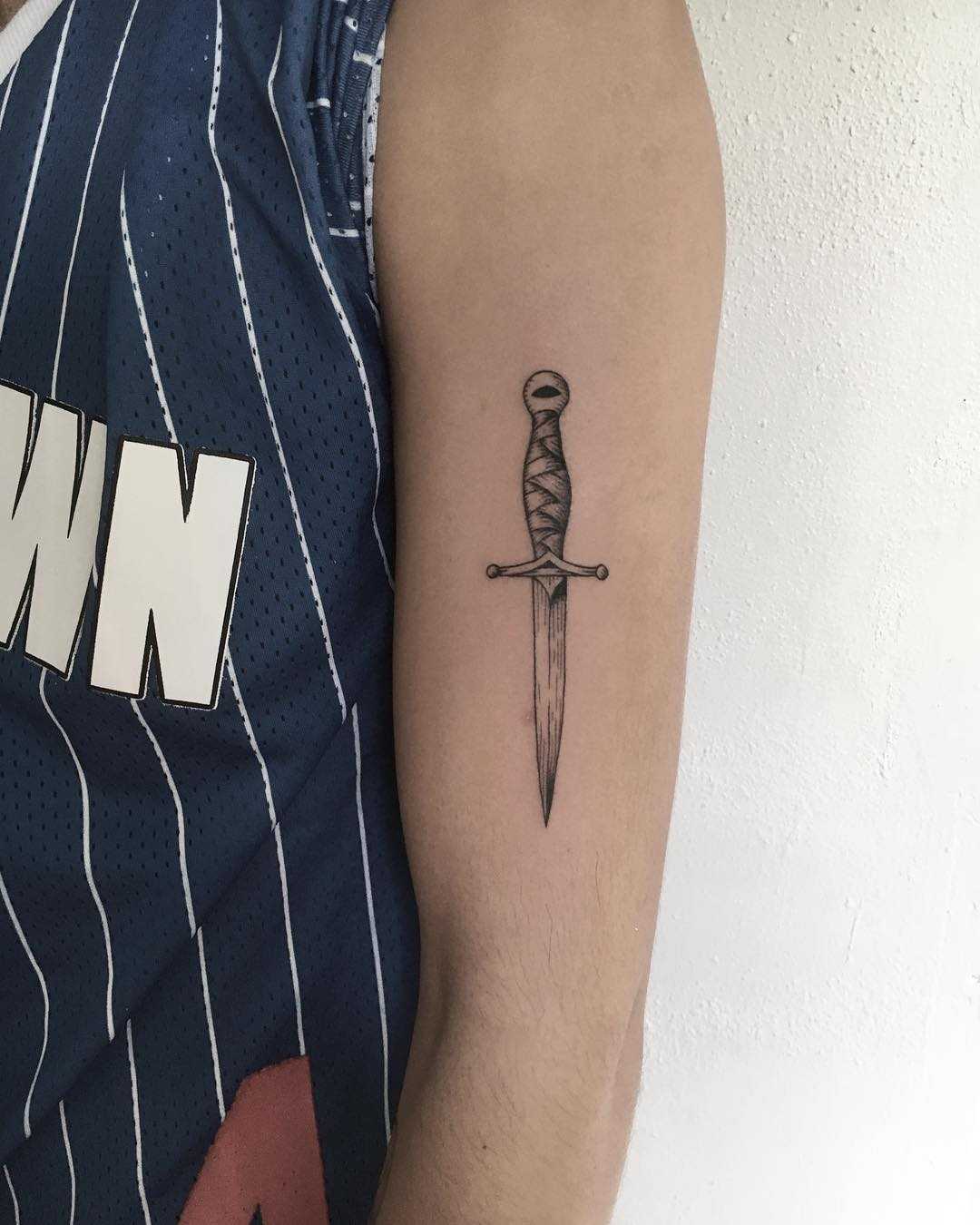 dagger arm tattoo