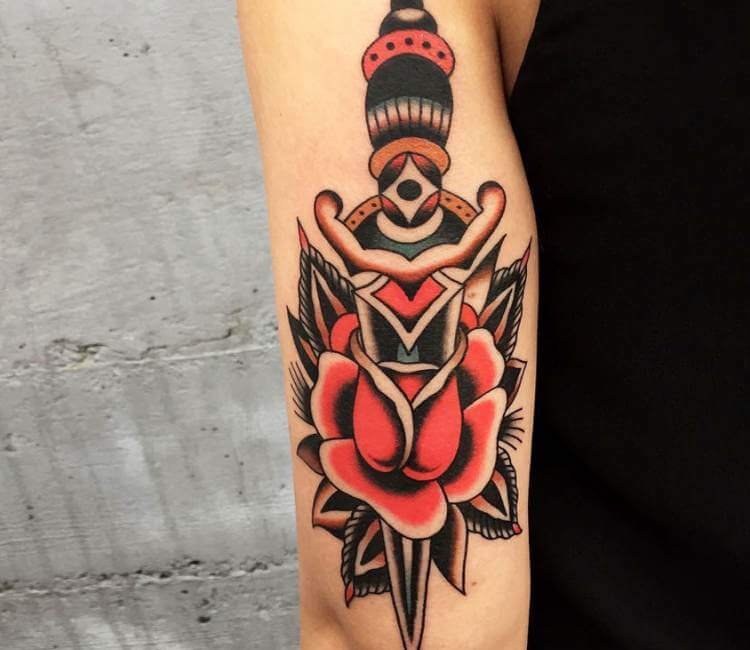 dagger arm tattoo