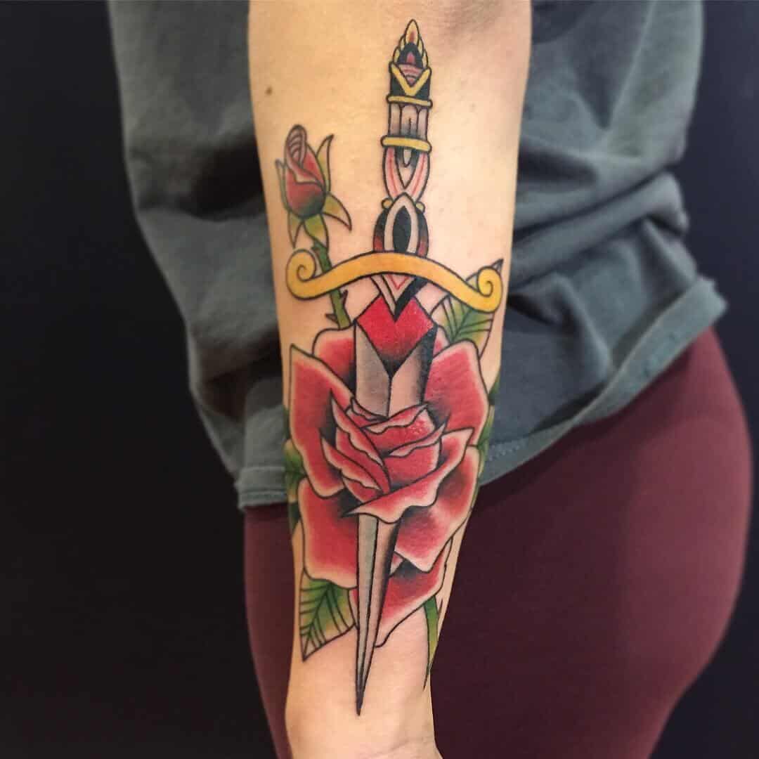 dagger arm tattoo