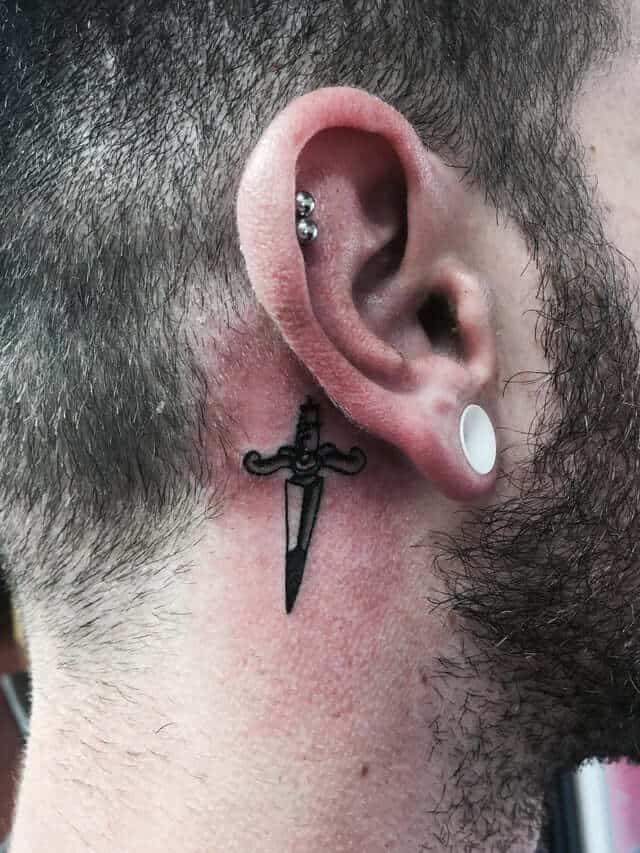 dagger ear tattoo