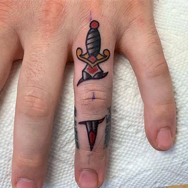 dagger finger tattoo