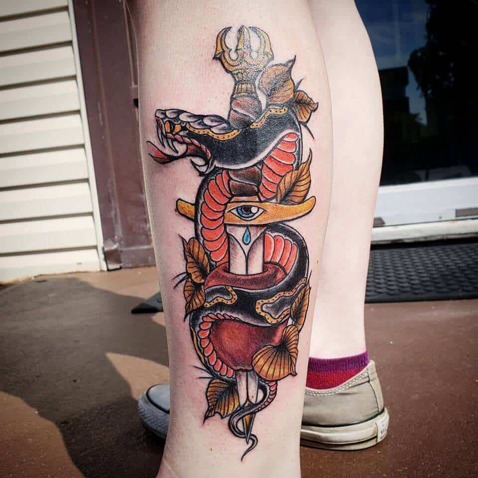 dagger tattoo on leg