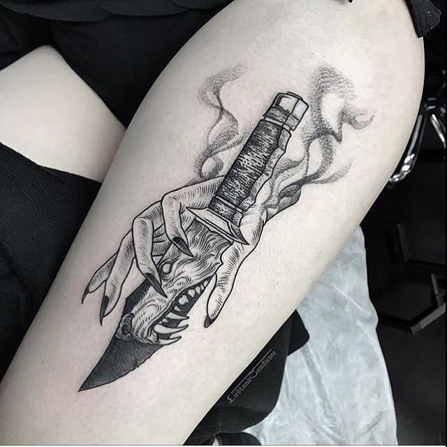 dagger thigh tattoo