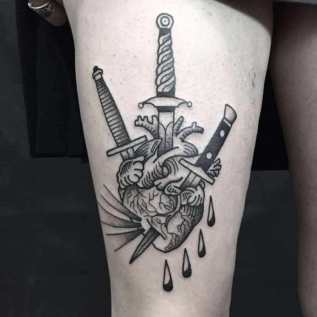 dagger thigh tattoo