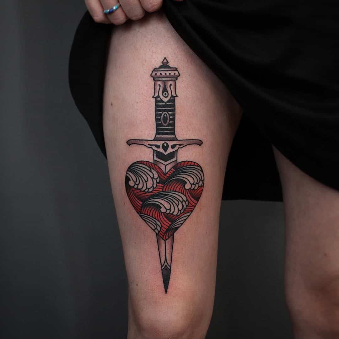 dagger thigh tattoo