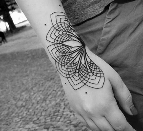 geometric hand tattoo