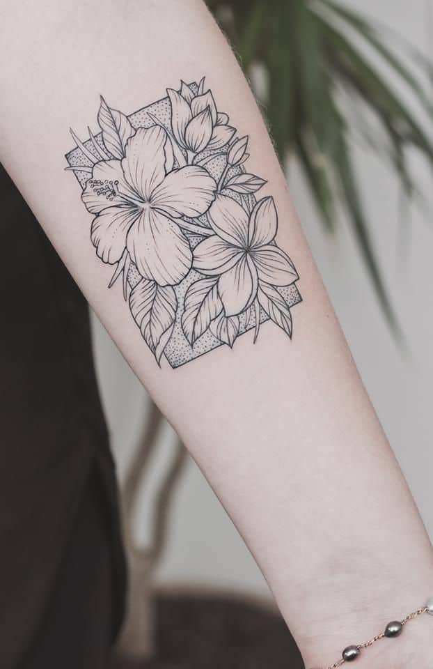 geometric hibiscus tattoo on arm