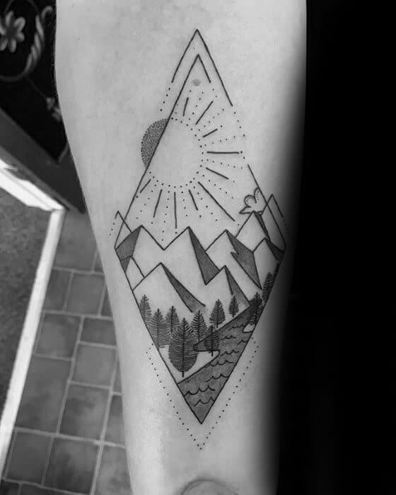 geometric mountain tattoo on arm