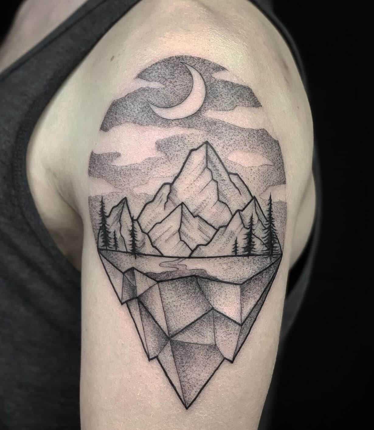 geometric mountain tattoo on arm