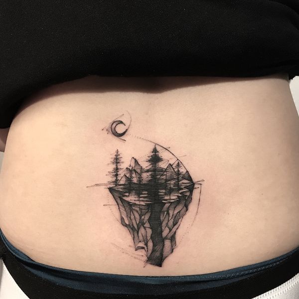 geometric mountain tattoo on stomach