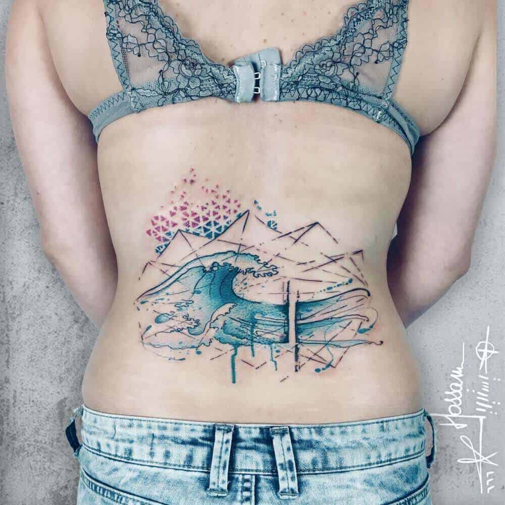 geometric ocean tattoo on back