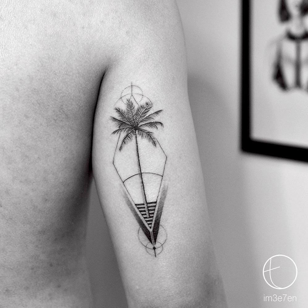 geometric palm tree arm tattoo