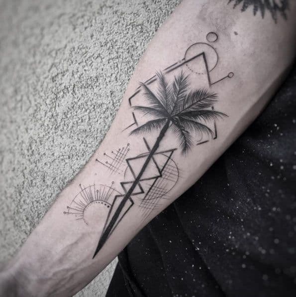 geometric palm tree tattoo on arm