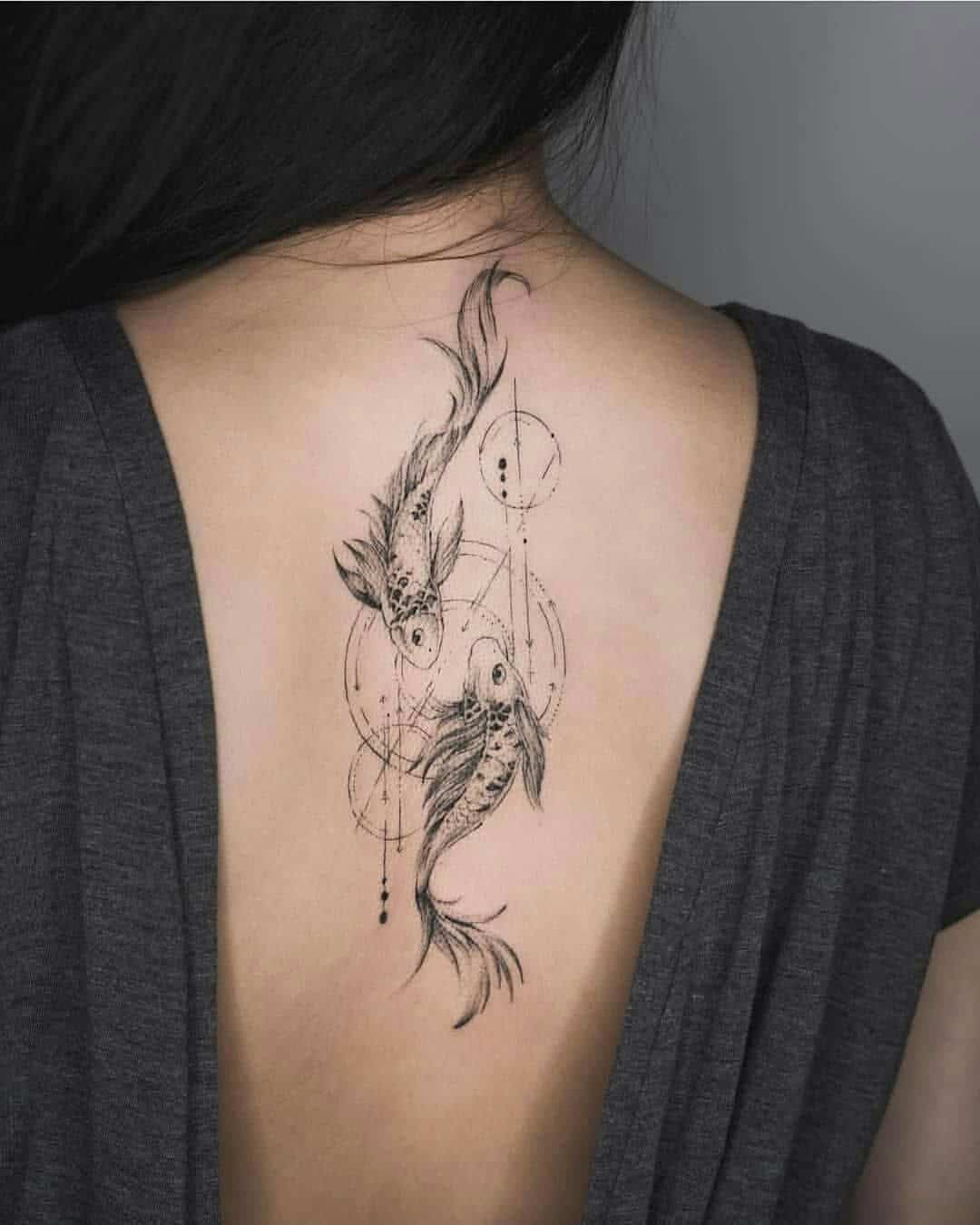 geometric sea creature tattoo on back