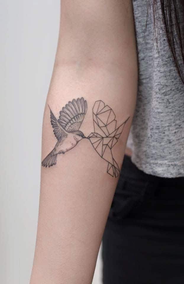 geometric sparrow tattoo on arm