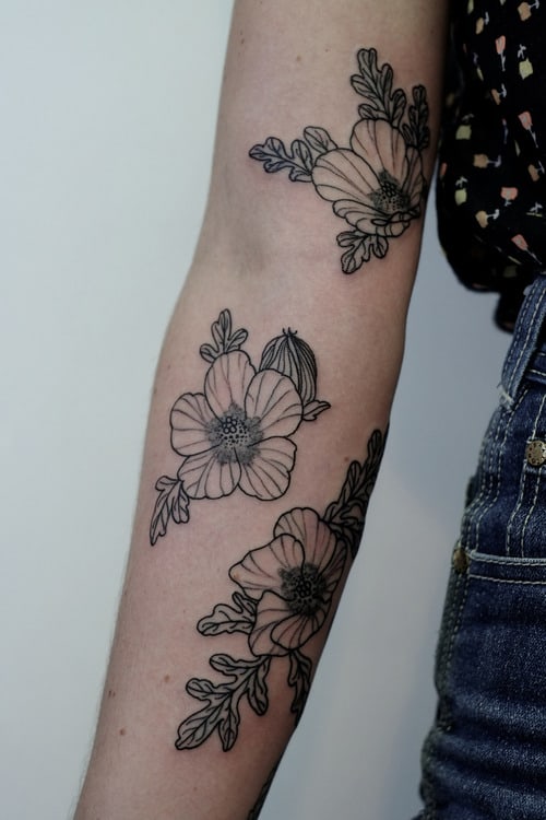 hibiscus arm tattoo