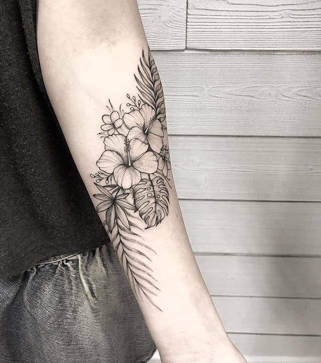 hibiscus arm tattoo