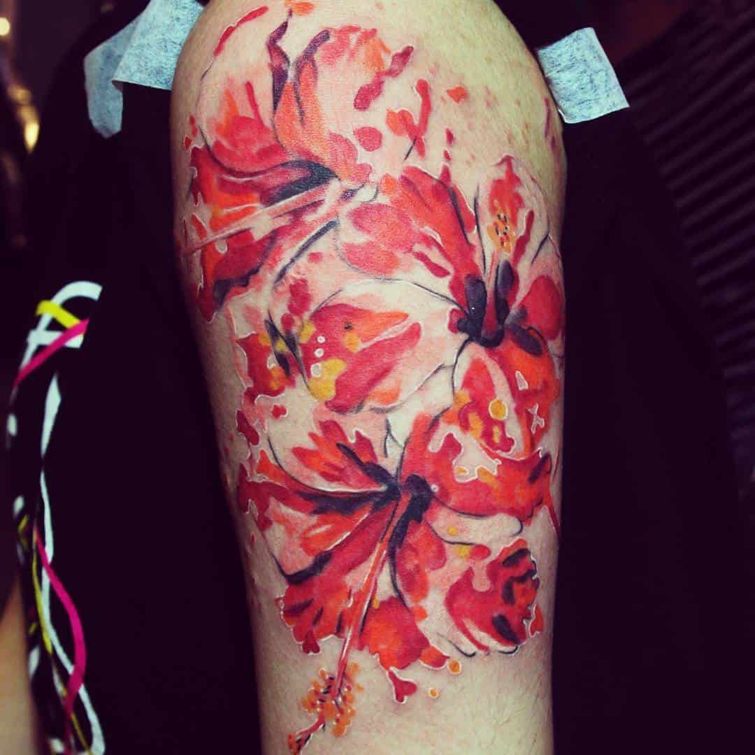 hibiscus arm tattoo