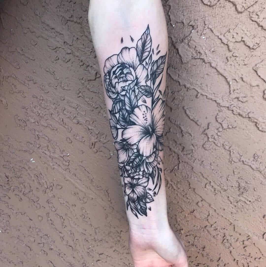 hibiscus arm tattoo