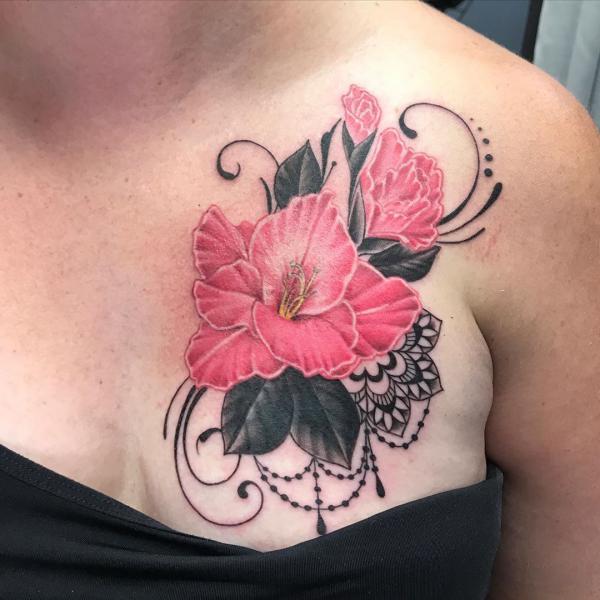 hibiscus chest tattoo