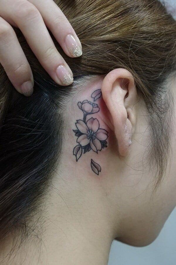 hibiscus ear tattoo