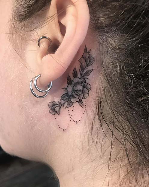 hibiscus ear tattoo