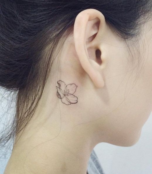 hibiscus ear tattoo