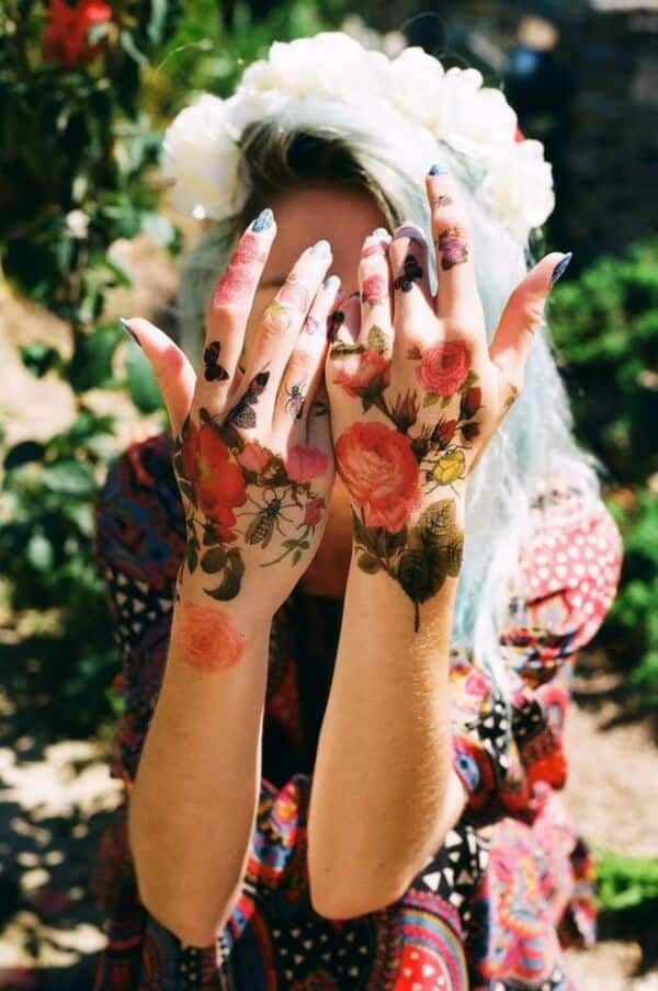 hibiscus hand tattoo
