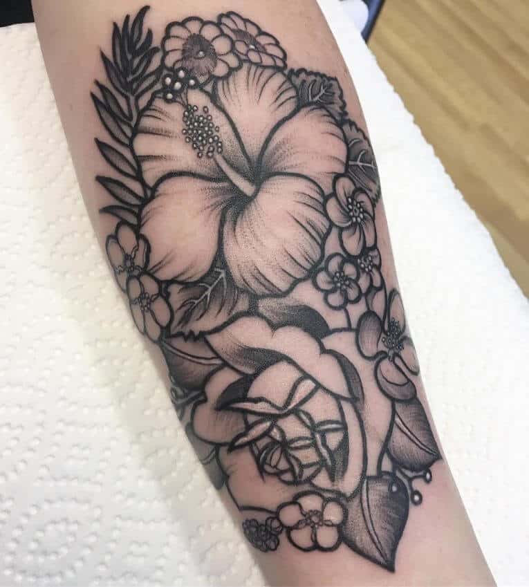 hibiscus leg tattoo