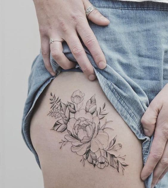hibiscus thigh tattoo