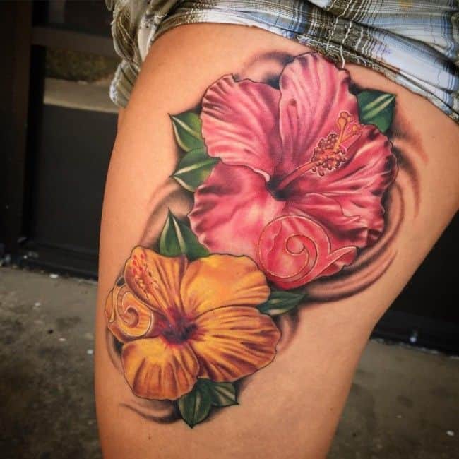 hibiscus thigh tattoo