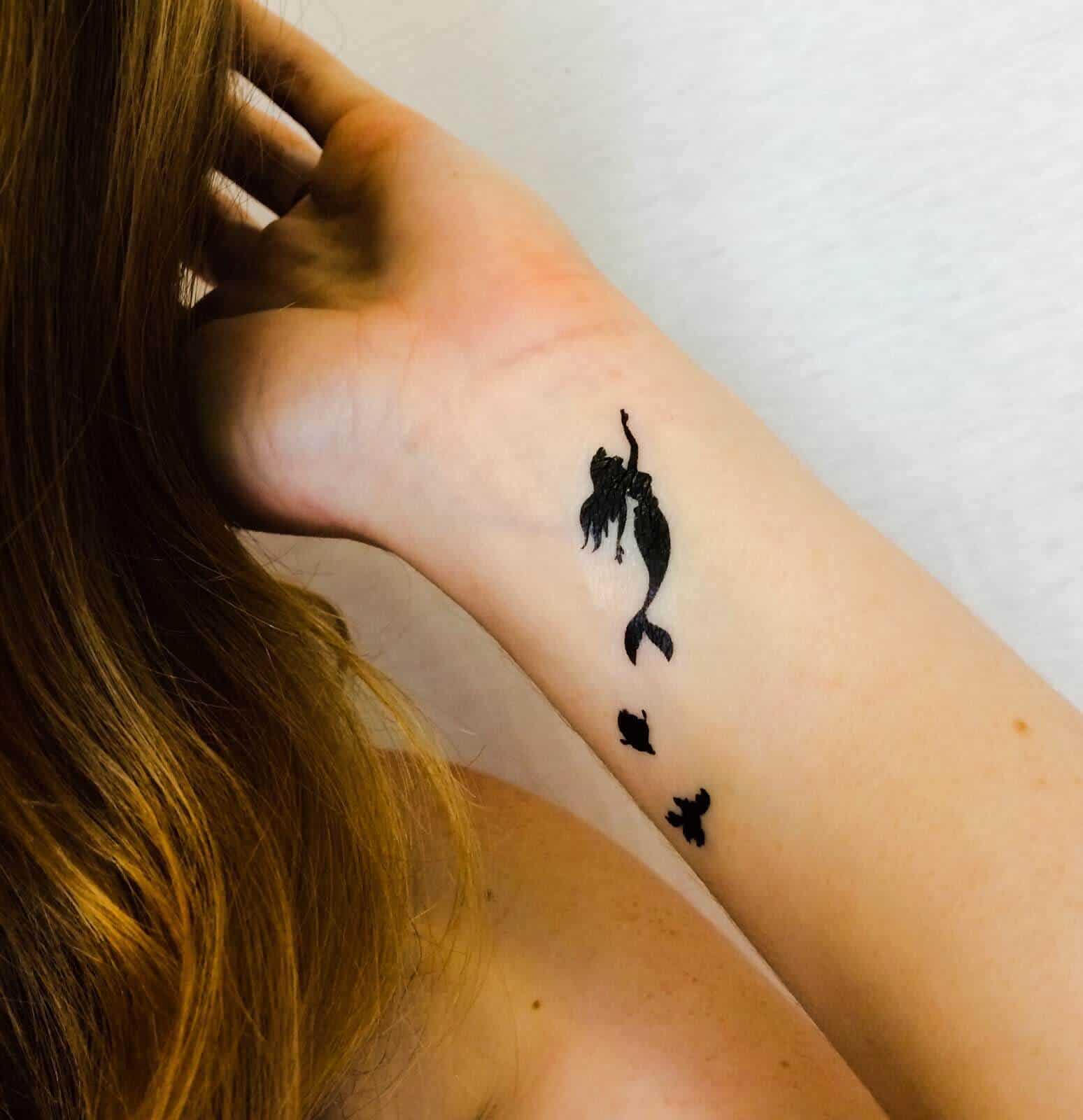 mermaid tattoo on wrist