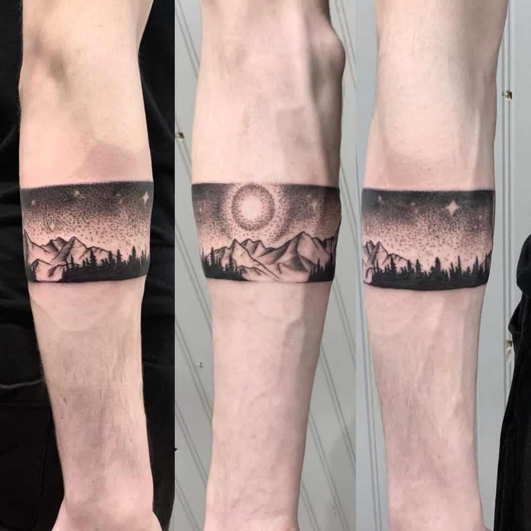 mountain tattoo on arm