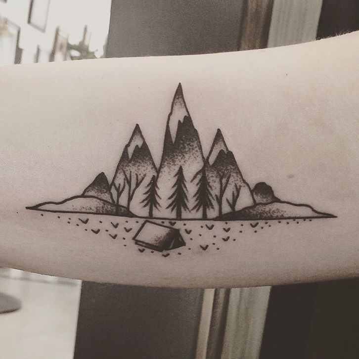 mountain tattoo on arm