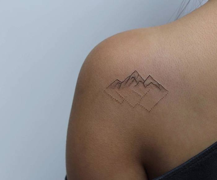 mountain back tattoo