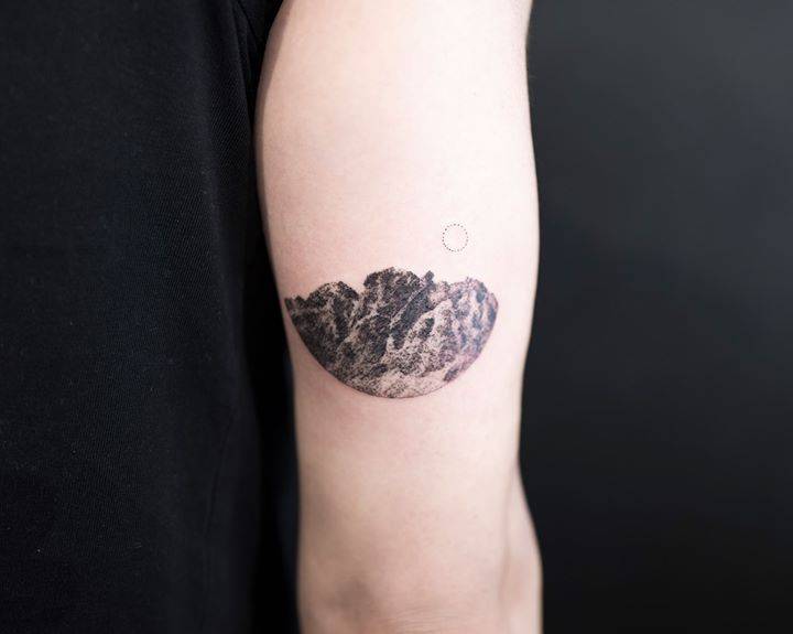 mountain elbow tattoo