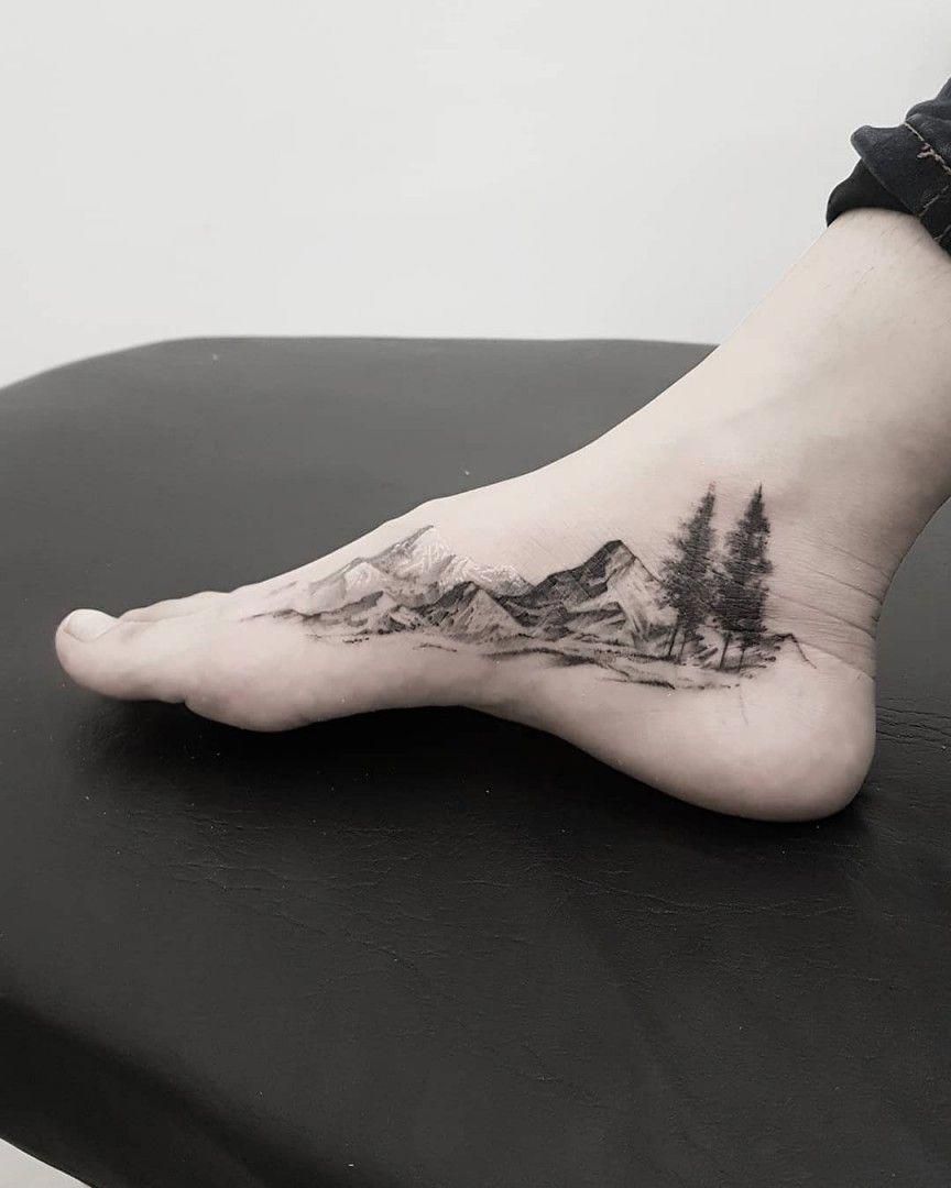 Mountains tattoo on a foot by Conz Thomas  Tattoogridnet