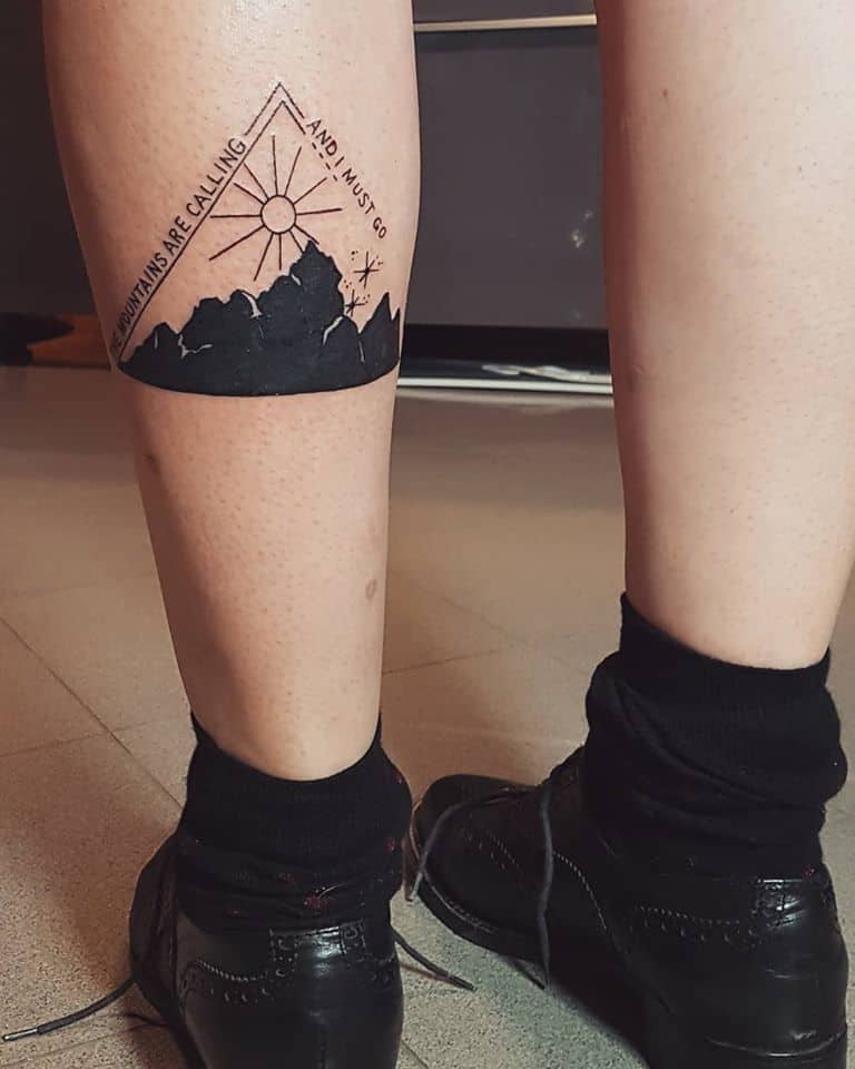 Showcase your adventurous spirit with a mountain range tattoo