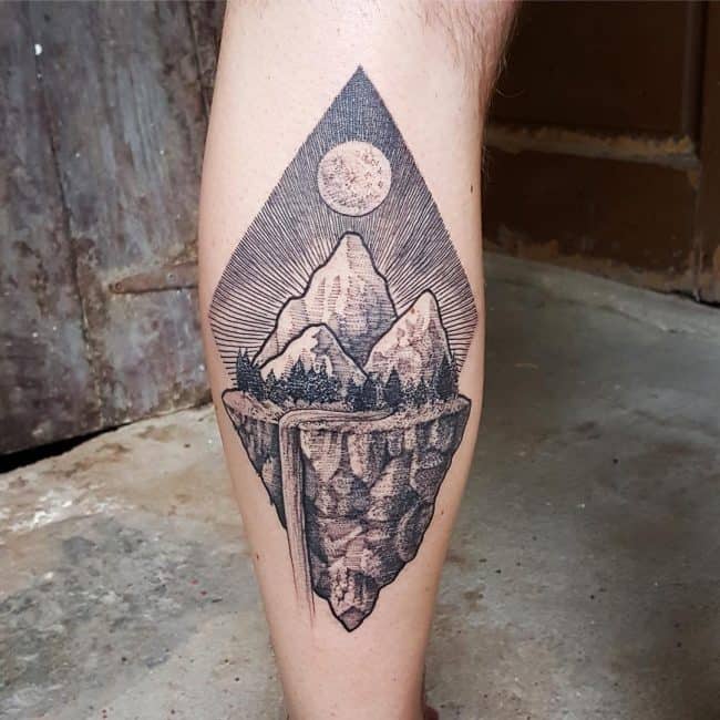 mountain on leg tattoo