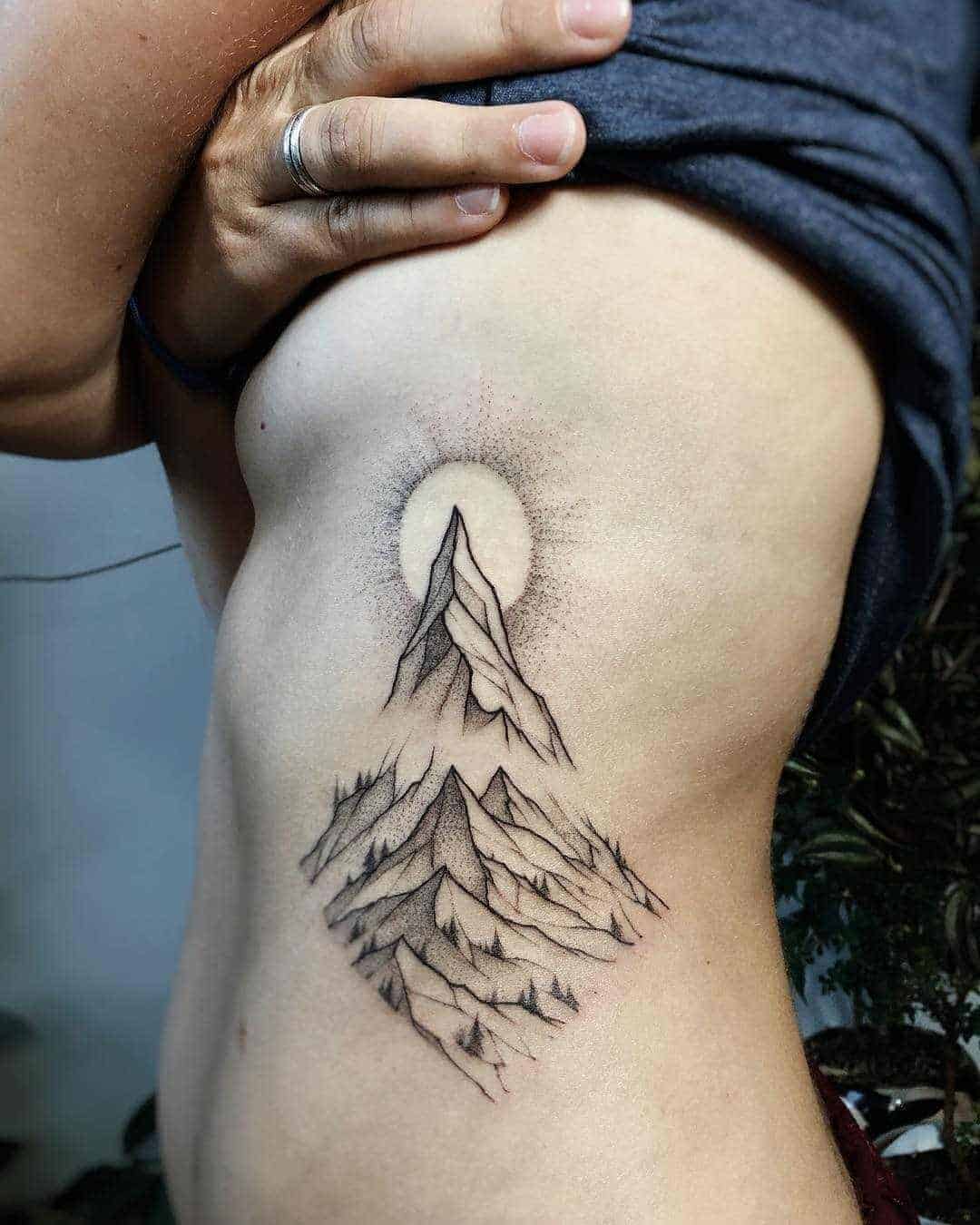 mountain rib tattoo