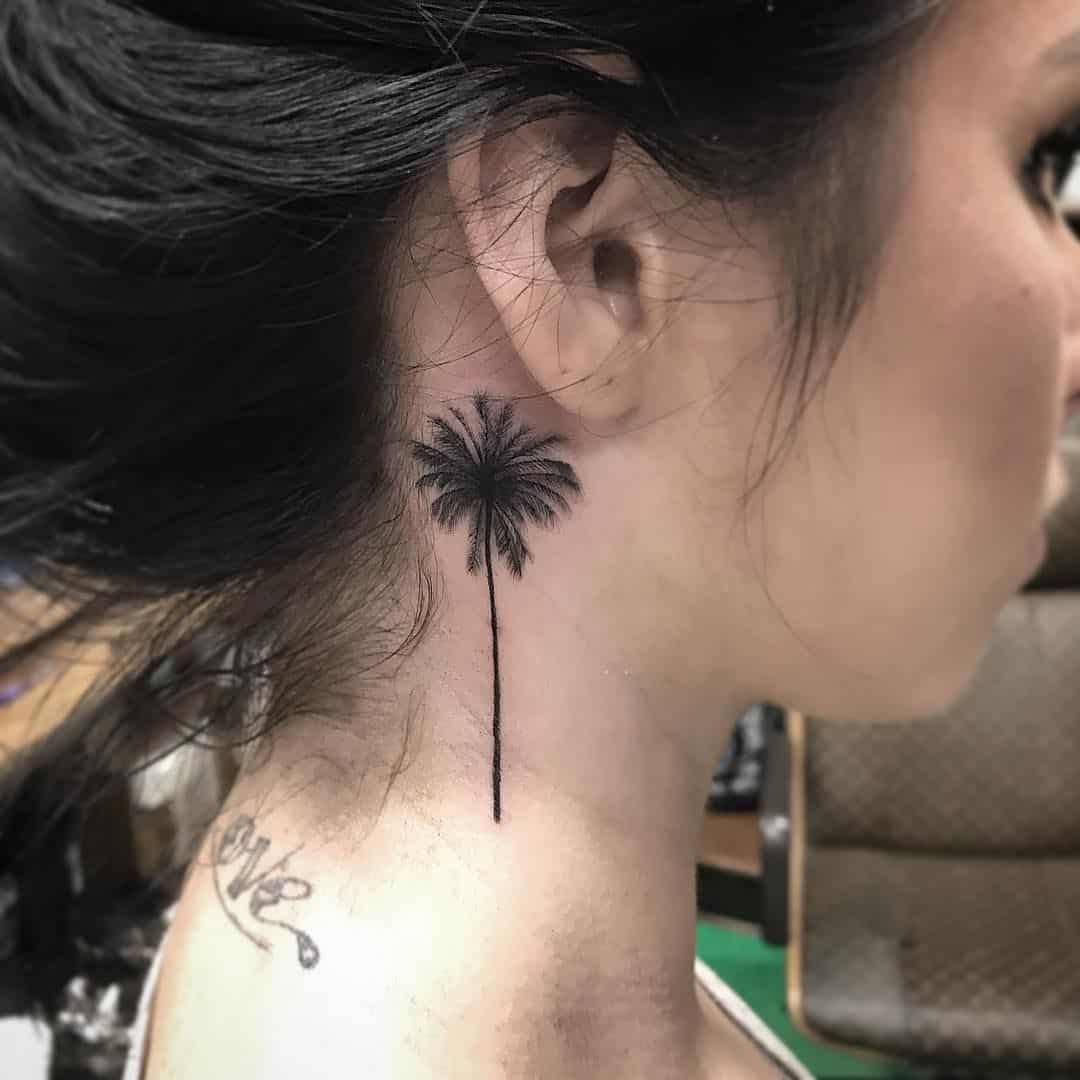 palm tree ear tattoo