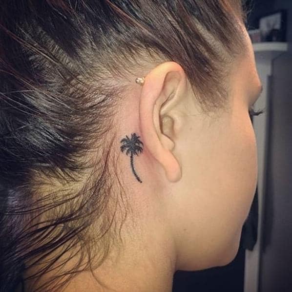 palm tree ear tattoo