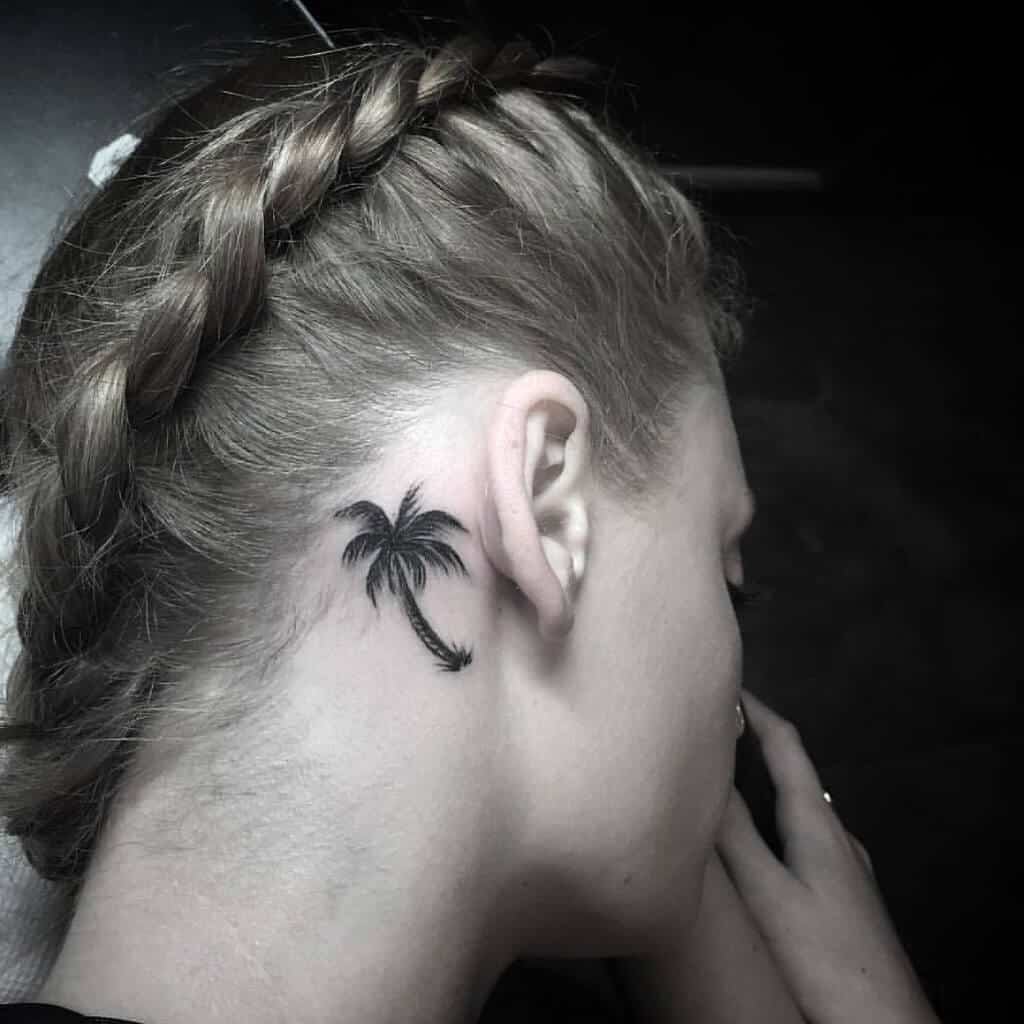 palm tree ear tattoo