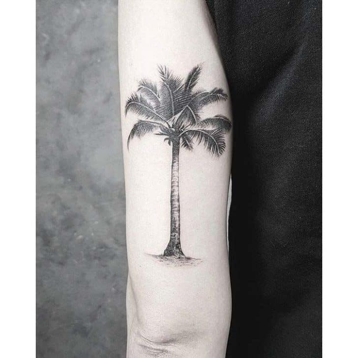 palm tree elbow tattoo