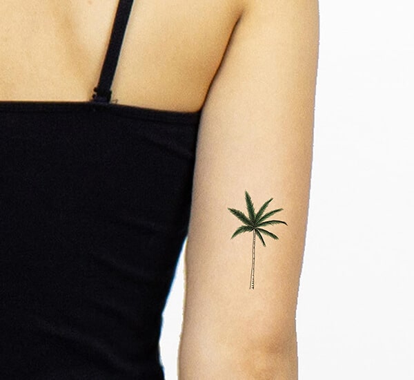 palm tree elbow tattoo